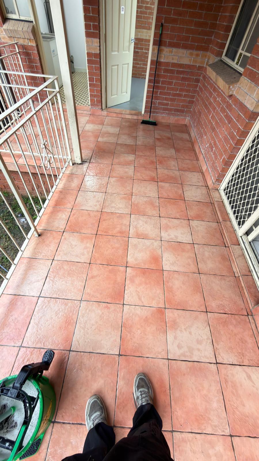 Real FirstChoice cleaning job on a terracotta-tiled patio